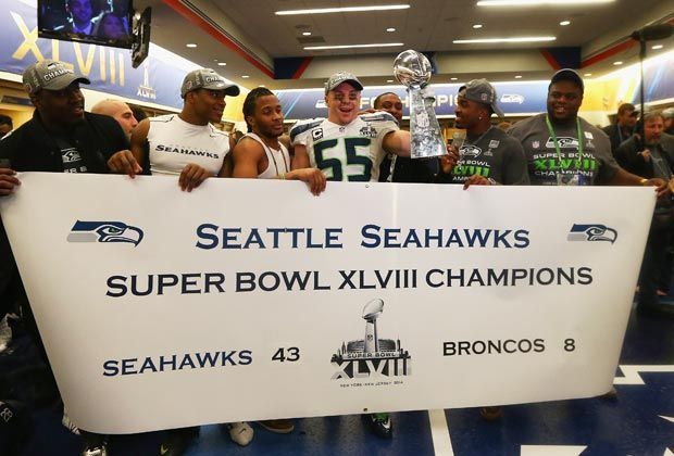 
                <strong>Seattles magische Nacht!</strong><br>
                Glückwunsch, Seattle! Die Seahawks zeigen im Super Bowl 48 eine nahezu perfekte Leistung und schlagen die Broncos in New York haushoch 43:8. Klar, dass die Athleten danach zu Ministern für Partyfetzigkeiten wurden.
              