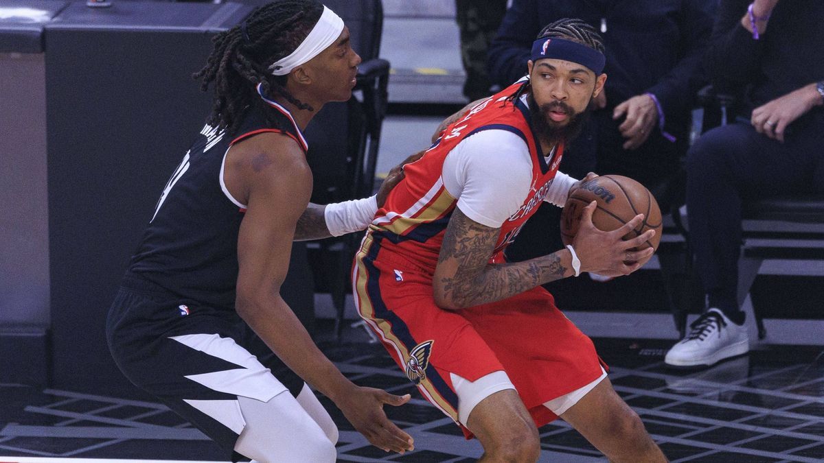 February 7, 2024, Los Angeles, California, USA: Brandon Ingram 14 of the New Orleans Pelicans receives the ball as Terance Mann 14 of the Los Angeles Clippers defends during their regular season NB...