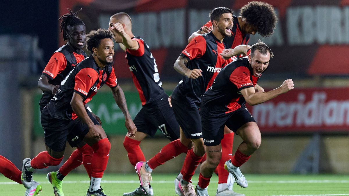 Hamrun Spartans players react in celebration after the decisive penalty scored by Jovan Cadjenovic (not in picture) during the penalty shoot out, after the UEFA Champions League First qualifying ro...