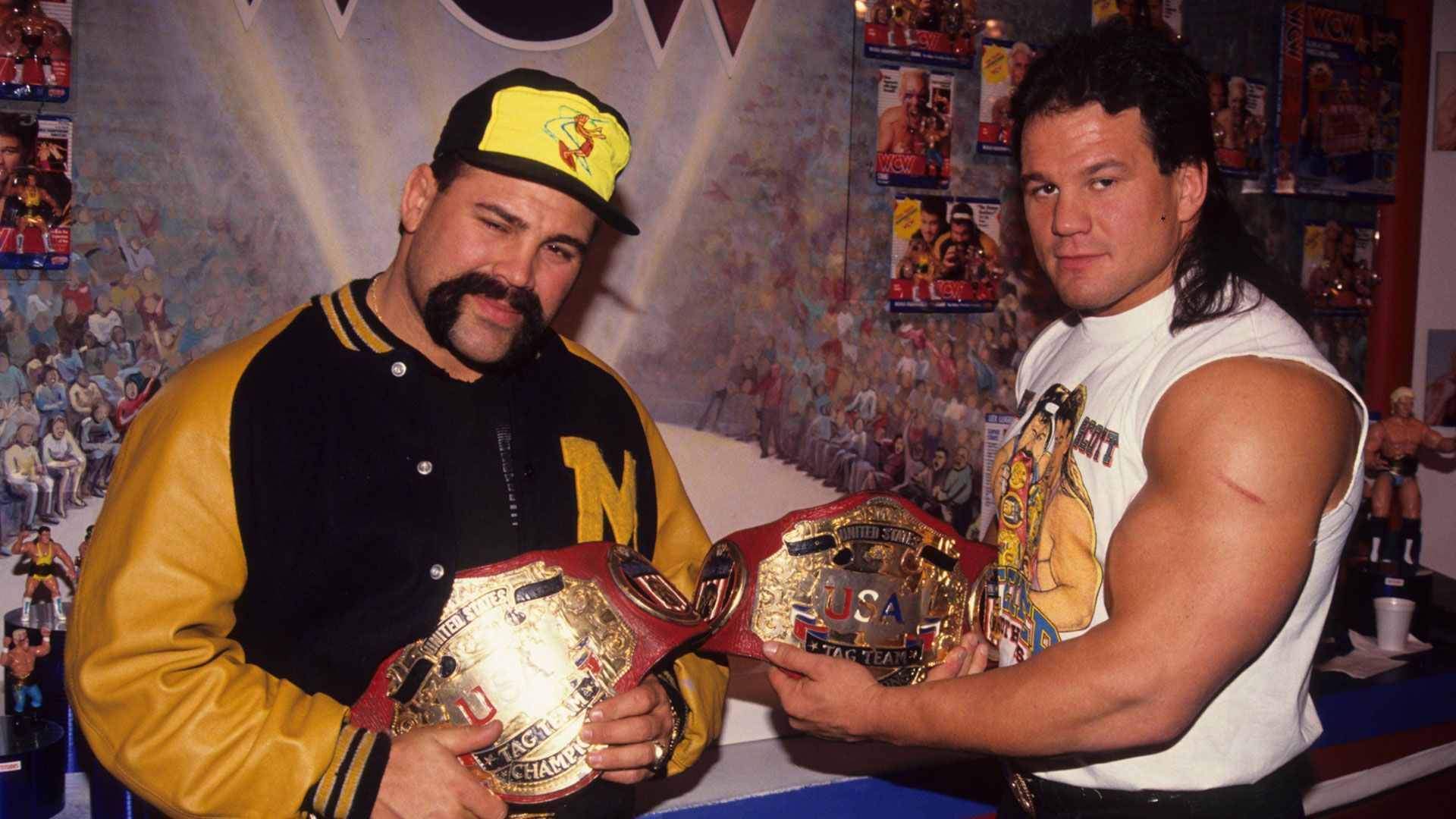 
                <strong>Rick und Scott Rechsteiner</strong><br>
                Die "Steiner Brothers" wurden als einziges Paar im diesjährigen Jahrgang in der Kategorie "Group" in die Ruhmeshalle aufgenommen. Gemeinsam gewannen die Brüder unter anderem zweimal die WWF Tag Team Championship. 
              