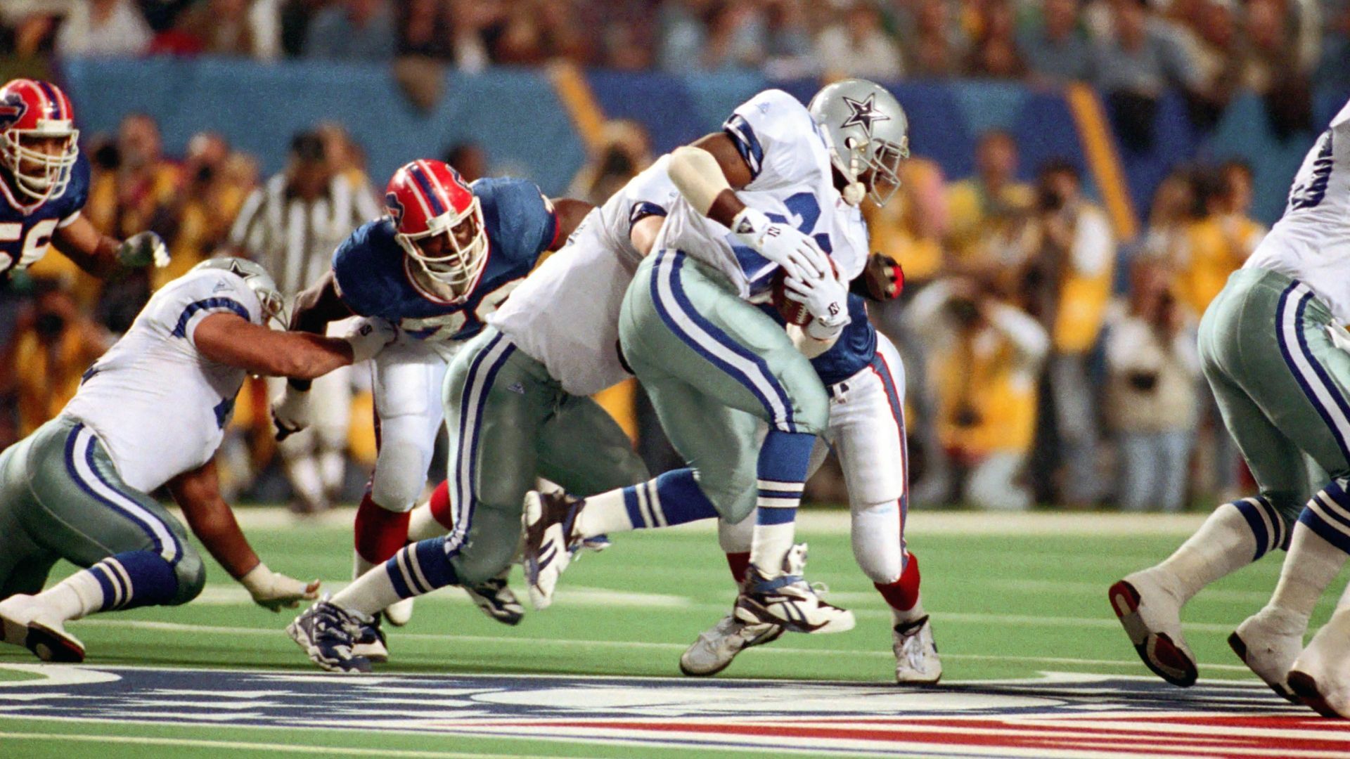 <strong>1994 - Dallas Cowboys</strong><br>Endstand: 30:13 gegen die Buffalo Bills<br>Coach: Jimmy Johnson<br>MVP: Emmitt Smith