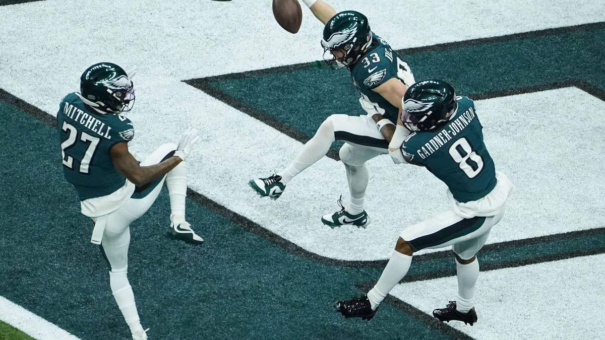 Philadelphia Eagles cornerback Cooper DeJean (33) celebrates with teammates after running back an interception of a pass from Kansas City Chiefs quarterback Patrick Mahomes for a 38-yard touchdown ...