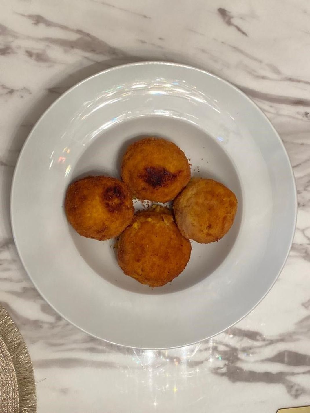 Hier gibt's das Rezept für die beliebte Vorspeise "Arancini di roso" aus Italien.