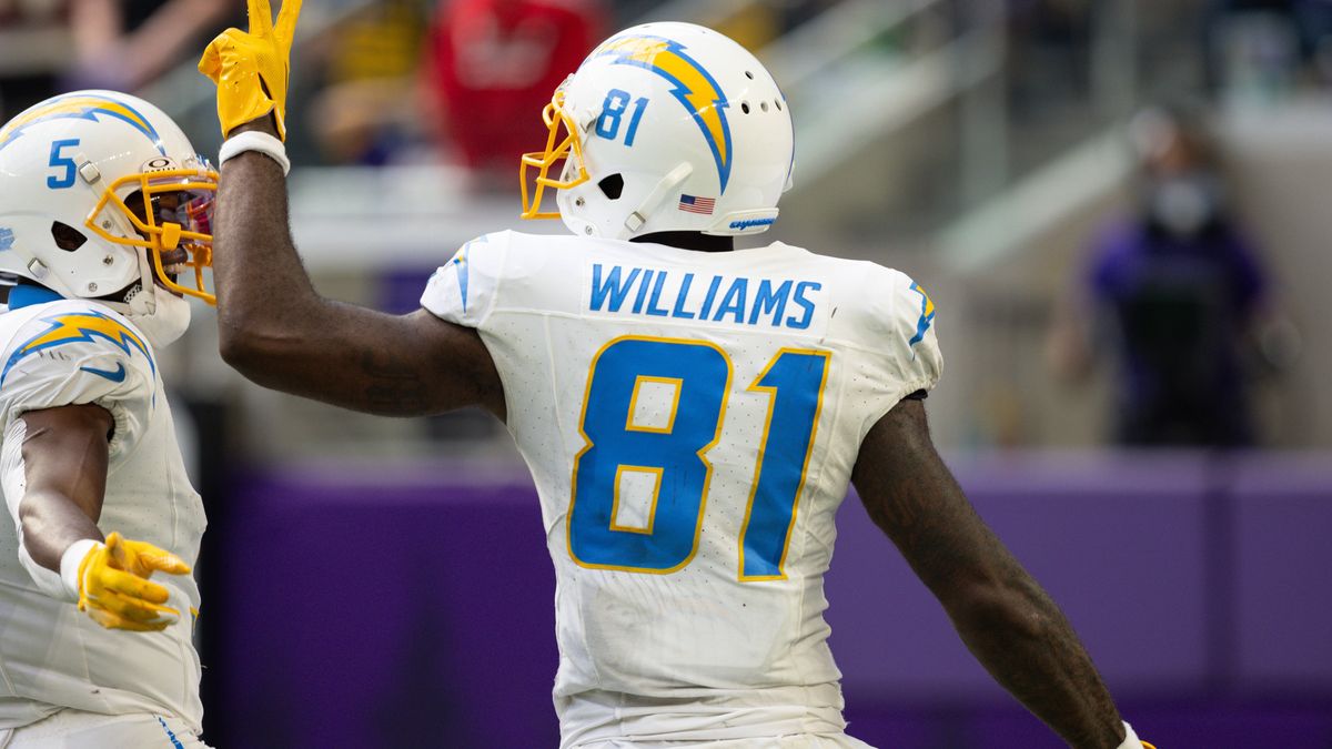 MINNEAPOLIS, MN - SEPTEMBER 24: Los Angeles Chargers wide receiver Mike Williams (81) celebrates a touchdown with wide receiver Joshua Palmer (5) during the NFL, American Football Herren, USA game ...