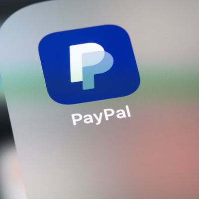 PayPal logo mobile app on screen smartphone iPhone closeup. Paypal is an internet based digital money transfer service. Batumi, Georgia - July 24, 2022