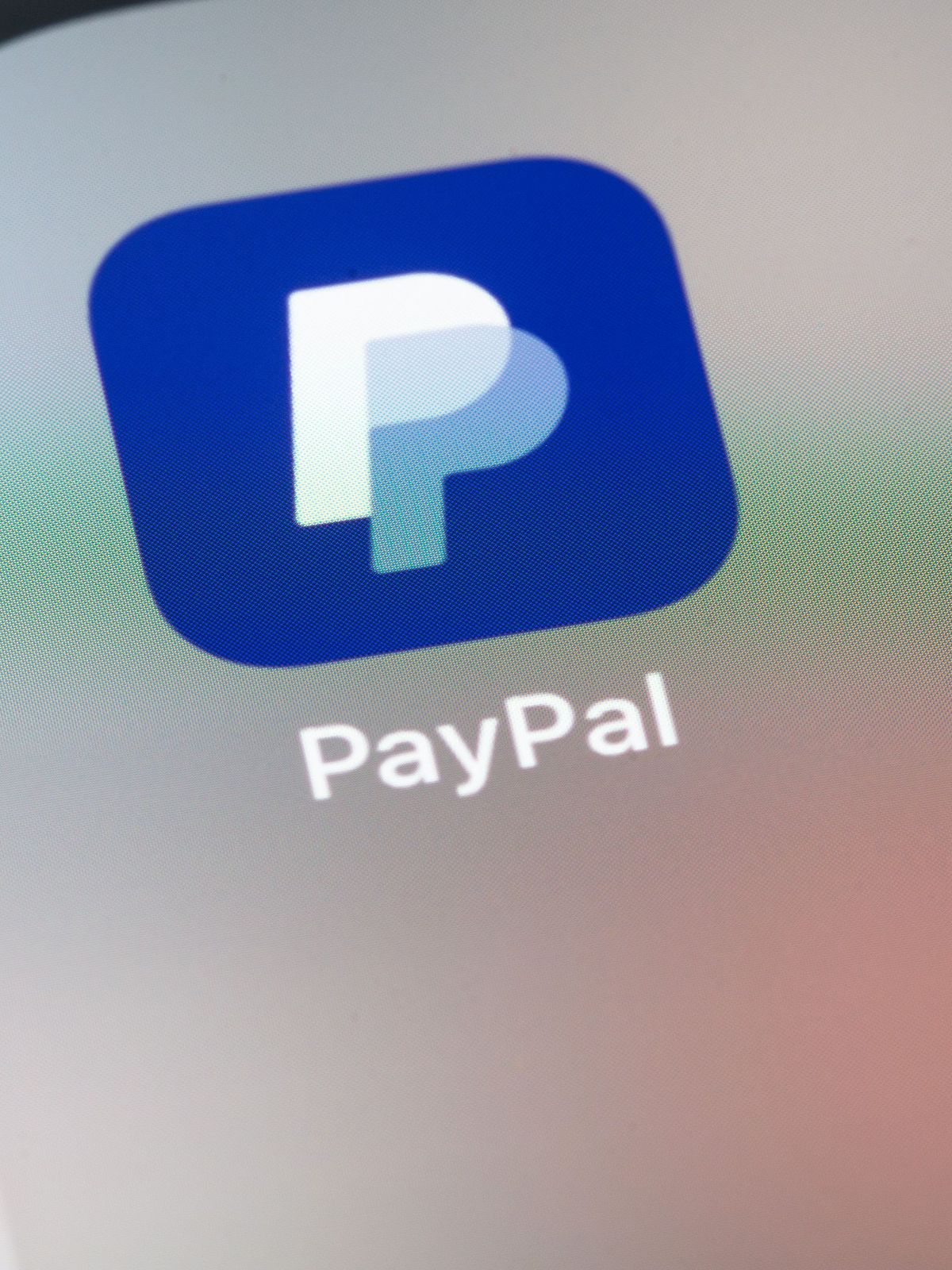 PayPal logo mobile app on screen smartphone iPhone closeup. Paypal is an internet based digital money transfer service. Batumi, Georgia - July 24, 2022