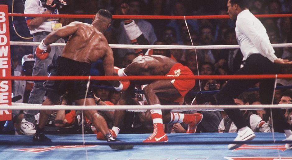 
                <strong>Mike Tyson</strong><br>
                Tysons setzte seinen Siegeszug fort, er vereinte die Gürtel von WBA, WBC und IBF und war im Alter von 21 Jahren unbestrittener Schwergewichts-Weltmeister. Mit seinen Gegnern machte er kurzen Prozess, kaum einer überstand die ersten Runden gegen "Kid Dynamite".
              