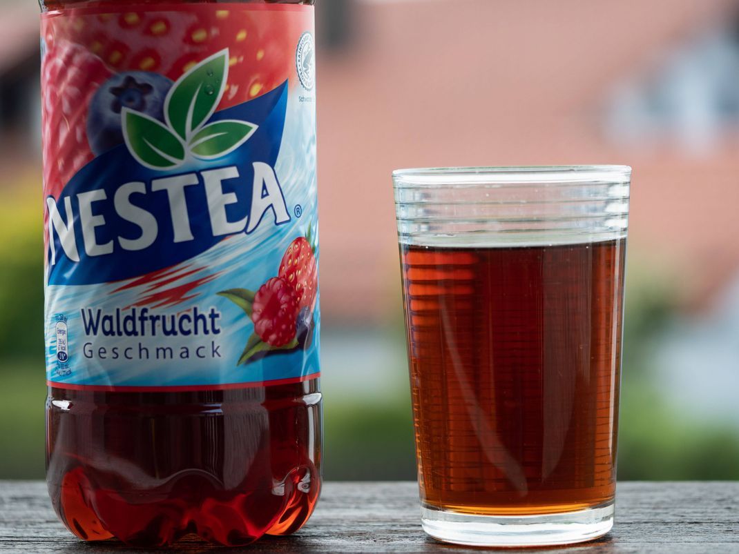 May 5, 2022, Vilshofen on the Danuba, Bavaria, Germany: A view of a glass and plastic bottle of Nestea Wild Berries Vilshofen on the Danuba Germany - ZUMAs197 20220505_zaa_s197_266 Copyright: xIgorxGolovniovx