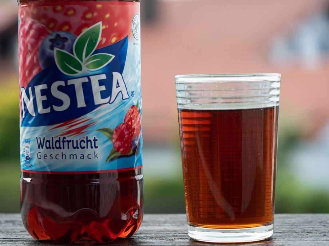 May 5, 2022, Vilshofen on the Danuba, Bavaria, Germany: A view of a glass and plastic bottle of Nestea Wild Berries Vilshofen on the Danuba Germany - ZUMAs197 20220505_zaa_s197_266 Copyright: xIgorxGolovniovx