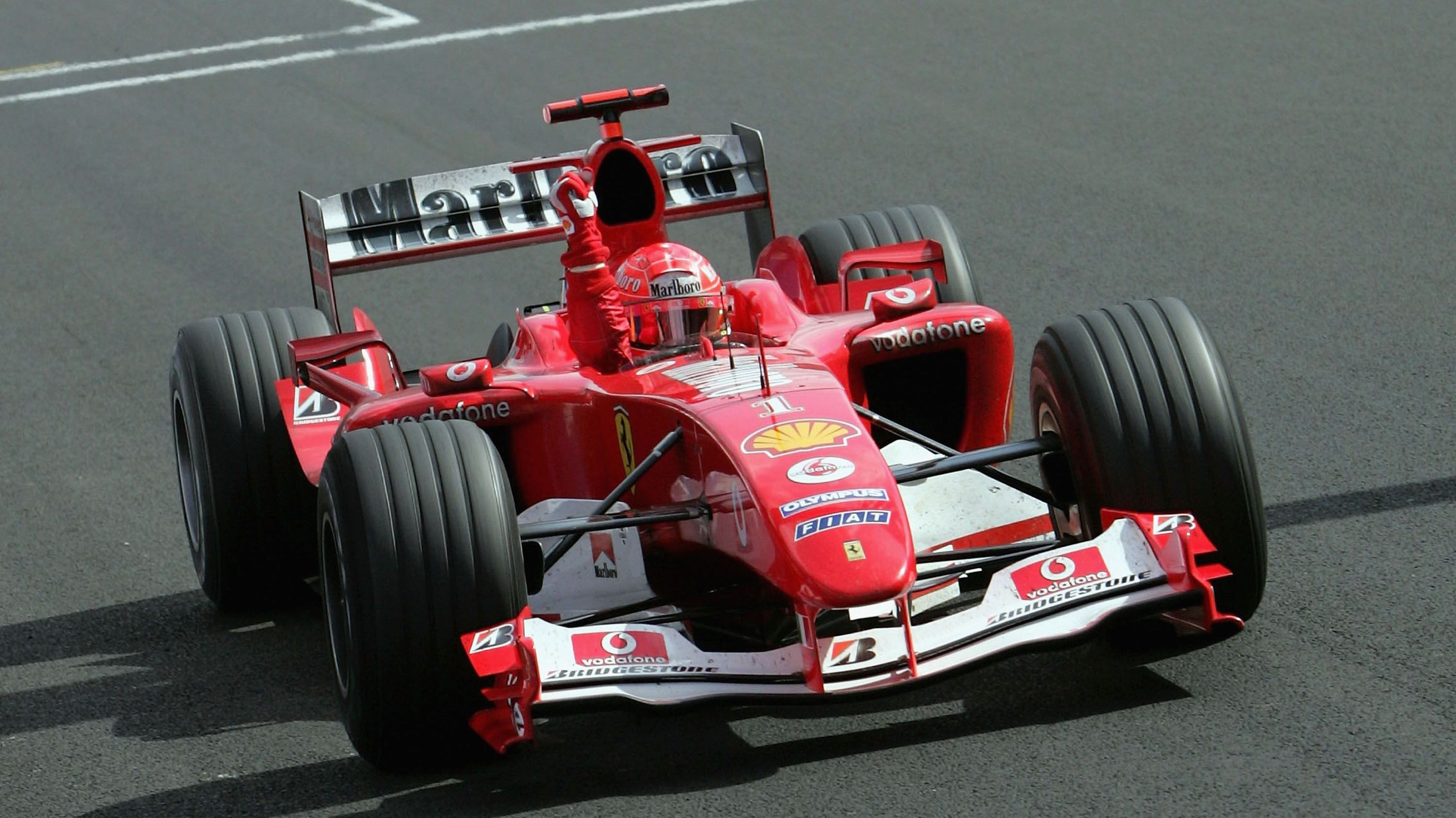 <strong>Platz 2 (geteilt): 2004 (Kimi Räikkönen)</strong><br>Seinen letzten Weltmeister-Titel konnte Michael Schumacher vier Rennen vor Schluss gewinnen - erneut beim Großen Preis von Belgien in Spa Francorchamps. Der zweite Platz hinter Kimi Räikkönen sicherte Schumi seinen siebten Titel vor Teamkollege Rubens Barrichello.