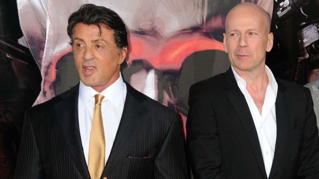 <em>The Expendables 3</em> brachte die zwei Action-Stars auseinander – doch Sylvester Stallone (links) und Bruce Willis konnten ihren Zank zumindest teilweise beilegen.