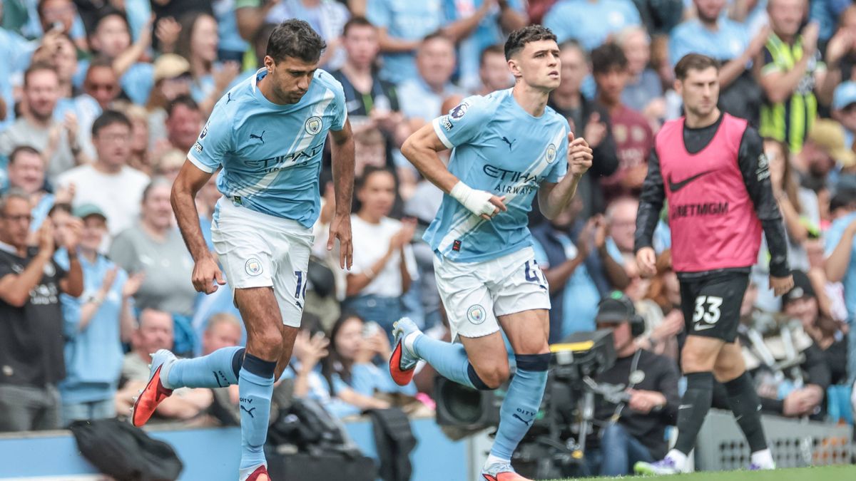 Premier League Manchester City v Tottenham Hotspur Rodri and Phil Foden of Manchester City are subbed on during the Premier League match Manchester City vs Tottenham Hotspur at Etihad Stadium, Manc...