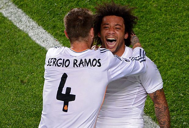 
                <strong>Champions-League-Finale: Real Madrid vs. Atletico Madrid</strong><br>
                Sergio Ramos (li.) und Marcelo begannen schon kurz nach Abpfiff mit ihrem persönlichen Contest: wer kann am emotionalsten jubeln. Extrapunkte gab es für Durchhaltevermögen und Anzahl der vergossenen Tränen. 
              