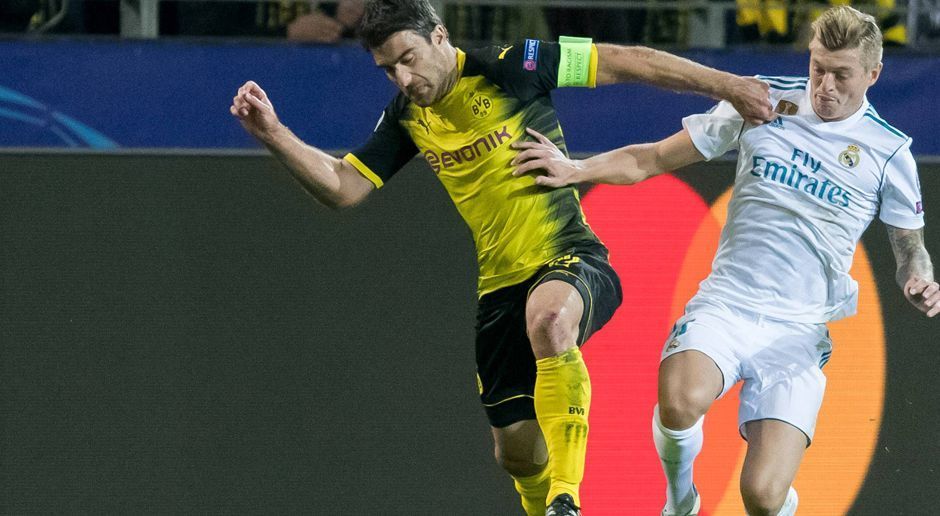 
                <strong>Sokratis</strong><br>
                Der Grieche überzeugt kaum gegen seine Gegenspieler Cristiano Ronaldo, Isco und Toni Kroos. Bei Angriffsversuchen der "Königlichen" lässt er die Angreifer zu weit vor das Tor kommen, geht nicht entschieden genug in die Zweikämpfe. In Halbzeit zwei wirkt er gefestiger, kann einmal stark gegen Gareth Bale klären. Beim 3:1 durch Ronaldo kommt er einfach nicht hinterher. ran-Note: 4
              