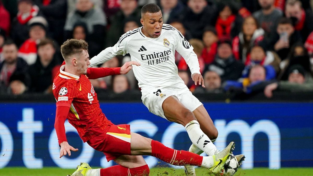 Liverpool v Real Madrid - UEFA Champions League - League Stage - Anfield Liverpool s Conor Bradley (left) tackles Real Madrid s Kylian Mbappe during the UEFA Champions League, league stage match at...