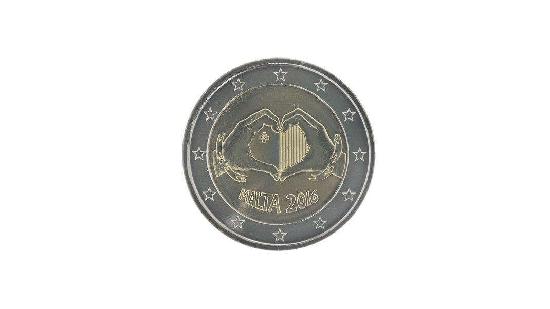 Commemorative 2 euro coin of Malta issued in 2016, dedicated to Solidarity through love,
First of the „from children in solidarity" series  isolated on white