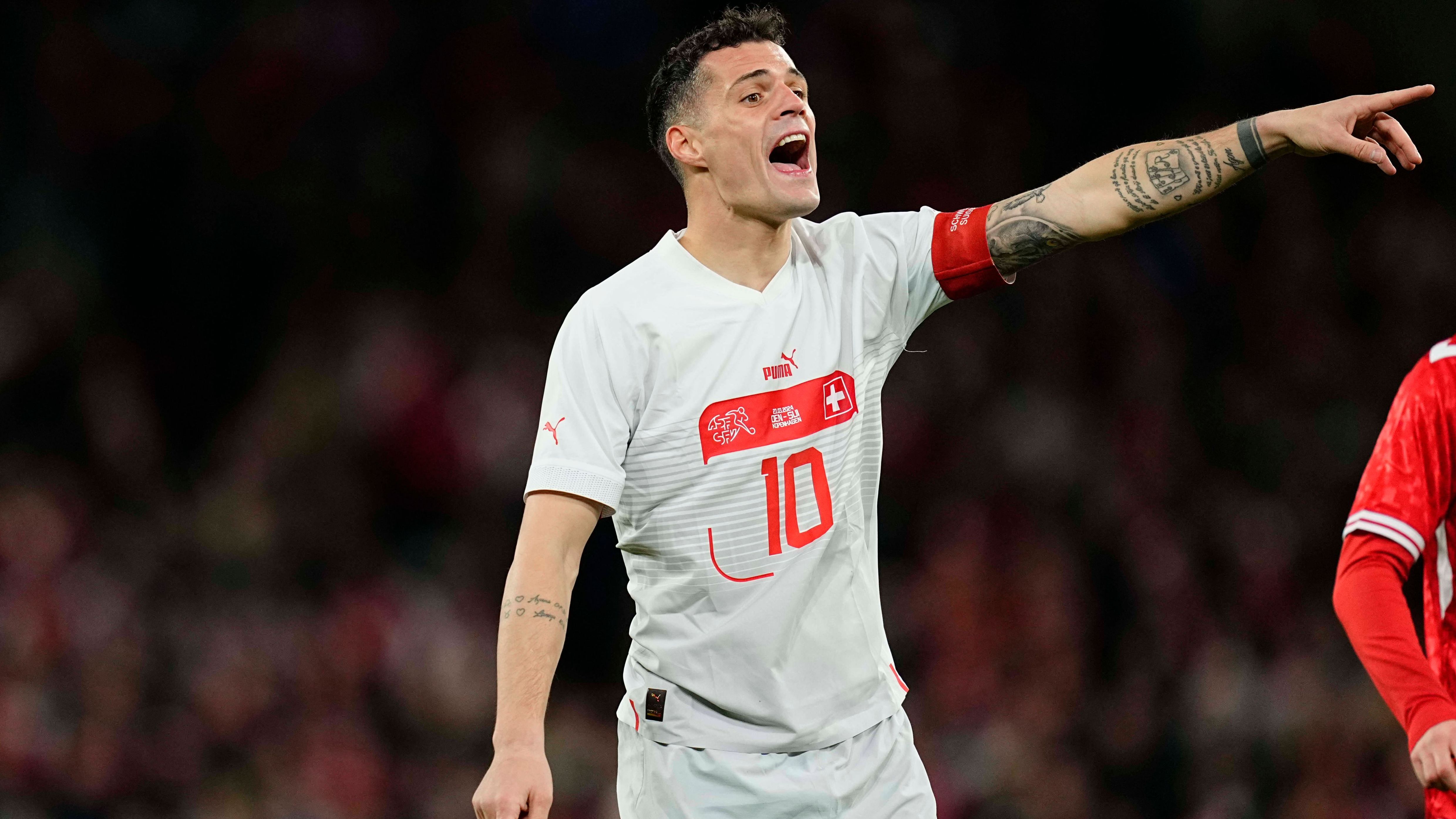 <strong>Schweiz: Granit Xhaka</strong><br>Verein: Bayer Leverkusen<br>Länderspiele: 123 (14 Tore)<br>Position: Defensiver Mittelfeldspieler<br>Alter: 31 Jahre<br>Marktwert: 20 Millionen Euro