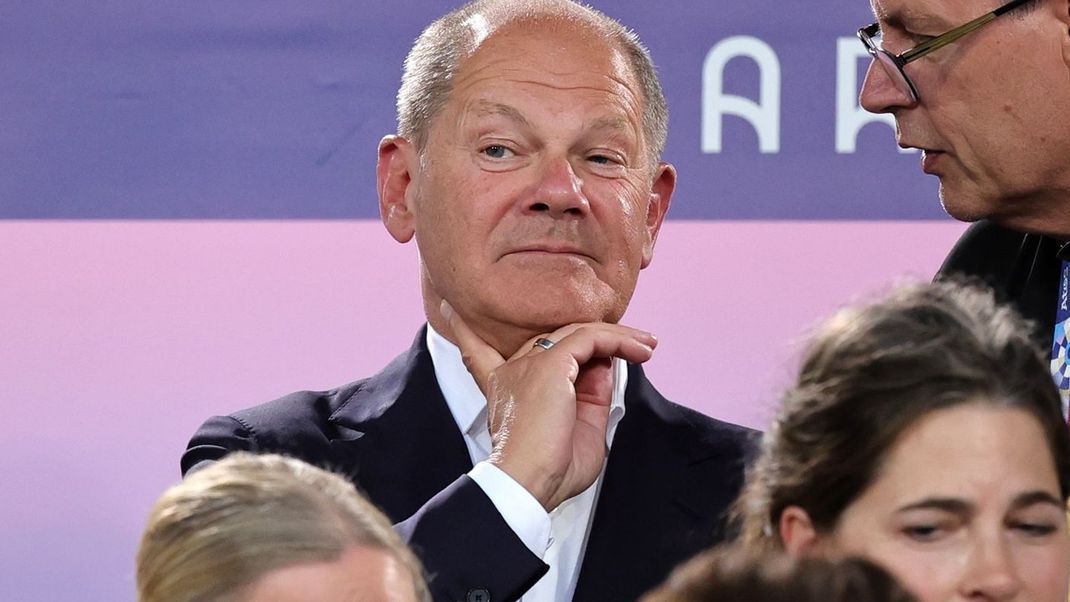 DOSB-Chef Thomas Weikert (r.) mit Bundeskanzler Olaf Scholz