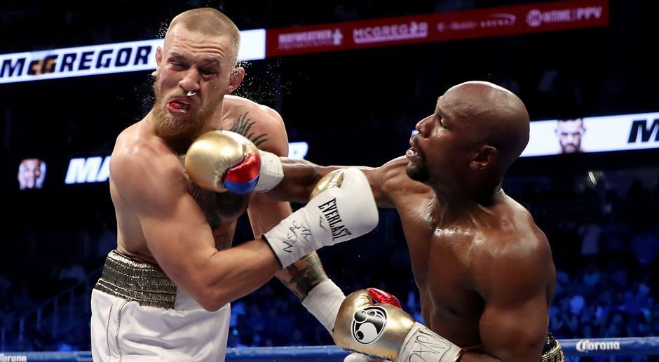 
                <strong>Mayweather schlägt McGregor</strong><br>
                Ab der sechsten Runde übernimmt der 40-jährige Amerikaner das Tempo und vor allem die Kontrolle über das Geschehen im Ring. Er landet von Runde zu Runde mehr Treffer.
              