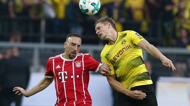 
                <strong>Franck Ribery (FC Bayern München)</strong><br>
                Franck Ribery: Neben Kimmich der beste Bayern-Akteur. Lässt Piszczek auf der linken Seite keine Chance und dribbelt sich immer wieder bis an die Strafraumgrenze oder darüber hinaus. Sehenswert seine Chance in der 15. Minute, als er am linken Strafraumeck abzieht und Bürki die Kugel gerade noch um den linken Pfosten lenken kann. Glänzt auch als Vorbereiter und setzt mit Diagonalpässen immer wieder Müller gut in Szene. Stellt den armen Piszczek auch der Pause vor unlösbare Probleme und bleibt stets ein Gefahrenherd. ran-Note: 2
              