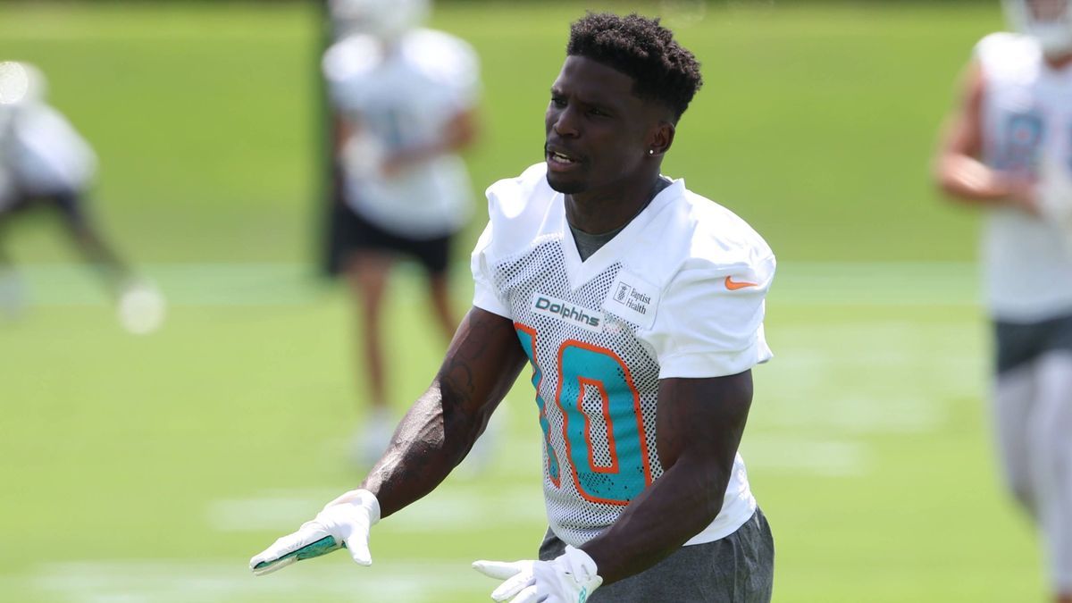 MIAMI GARDENS, FL - JUNE 04: Miami Dolphins wide receiver Tyreek Hill (10) gives advise to receivers during the Miami Dolphins Mini Camp on Tuesday, June 4, 2024 at Baptist Health Training Complex ...