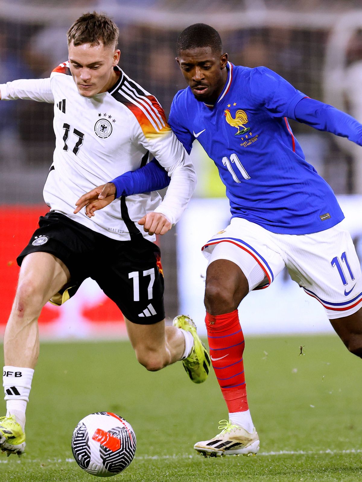 WIRTZ Florian Team Deutschland mit DEMBELE Ousmane Laenderspiel Frankreich - Deutschland 0 : 2 am 23. 03. 2024 in Lyon DFL REGULATIONS PROHIBIT ANY USE OF PHOTOGRAPHS as IMAGE SEQUENCES and or QUAS...