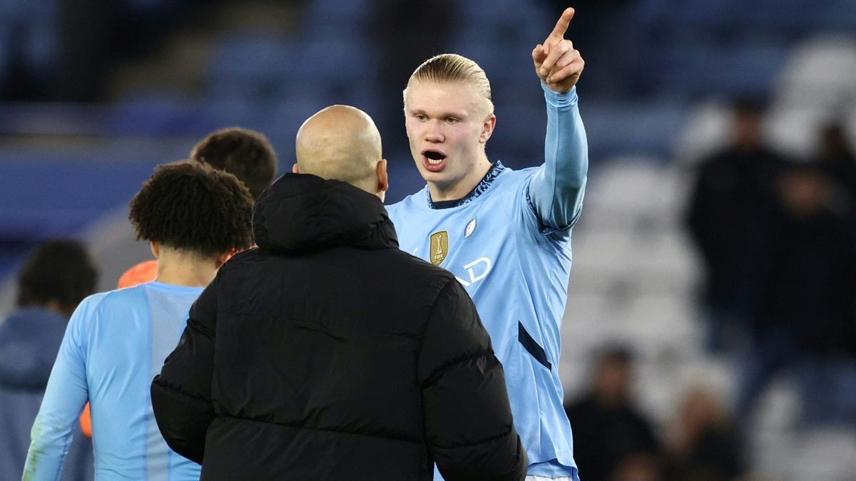 Citys Erling Haaland (r.) mit Trainer Pep Guardiola