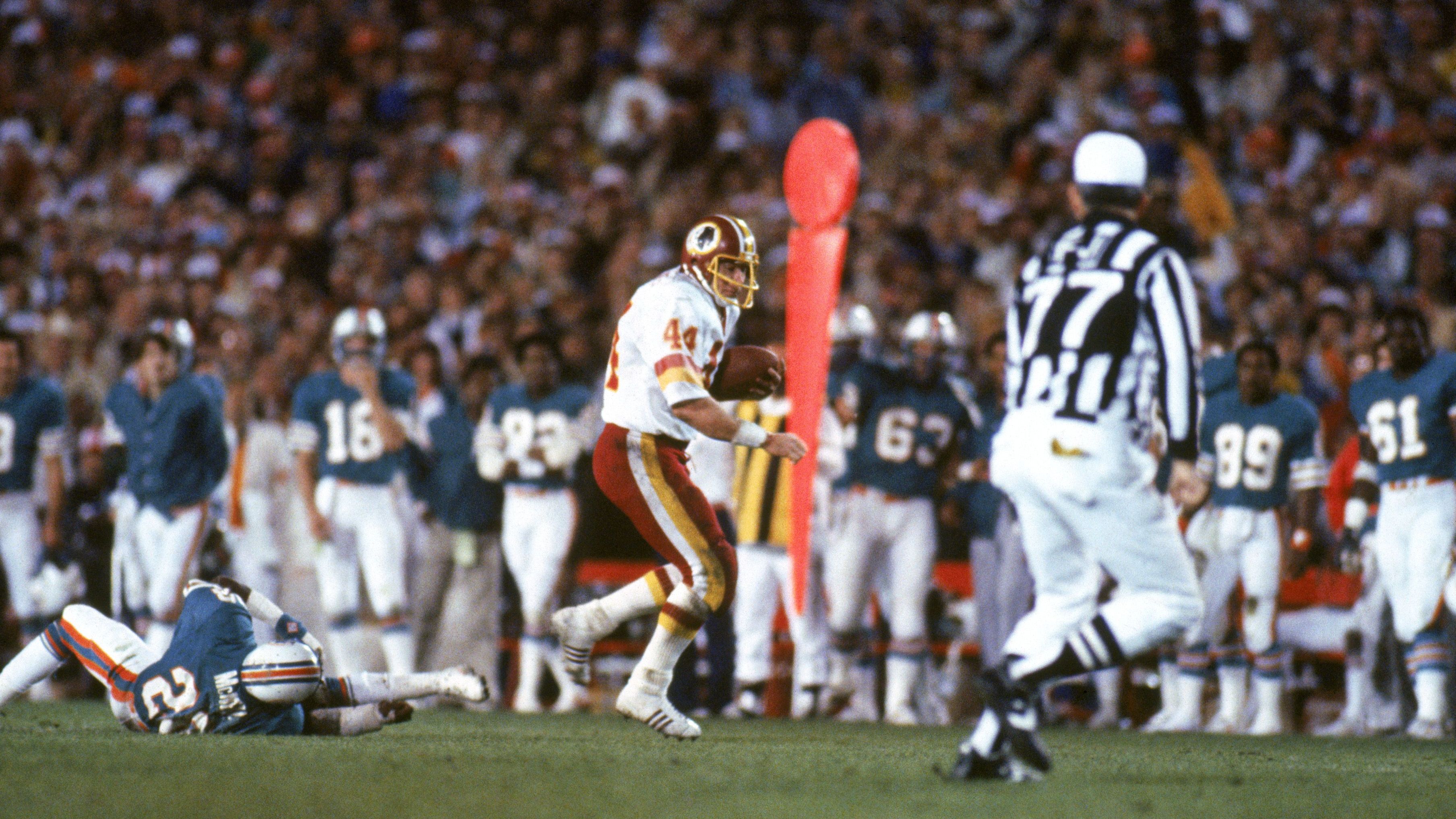 <strong>Platz 1 (geteilt): John Riggins (1983)</strong><br>- 15 Spiele<br>- Washington Redskins (heute: Washington Commanders)