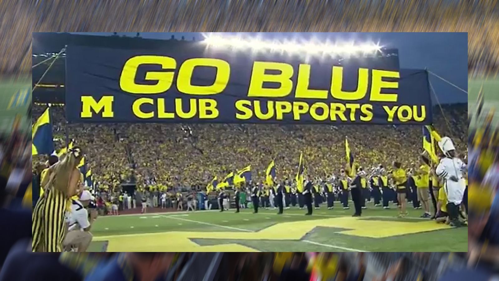 
                <strong>Go-Blue-Banner</strong><br>
                Bereits seit 1962 ist das Banner mit der Aufschrift "GO BLUE" fester Bestandteil des Einlaufs der Wolverines ins Michigan Stadium. Die Absolventen der Universität, der "M" Club, zeigte das Banner zum ersten Mal beim Spiel gegen Illinois und seither durchlaufen die Spieler beim Einmarsch das Banner und berühren es traditionell dabei. Das Banner wurde seit 1962 bereits zwei Mal von Unbekannten gestohlen.
              