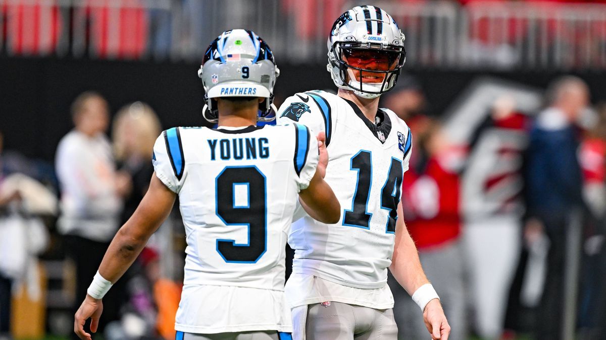 ATLANTA, GA Ð JANUARY 05: Carolina quarterbacks Bryce Young (9) and Andy Dalton (14) warm up prior to the start of the NFL, American Football Herren, USA game between the Carolina Panthers and the ...