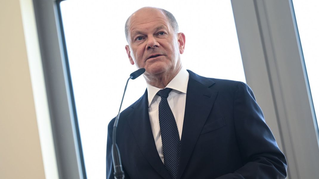 Bundeskanzler Scholz will den Kampf gegen HIV mit Finanzierungen weiterführen.