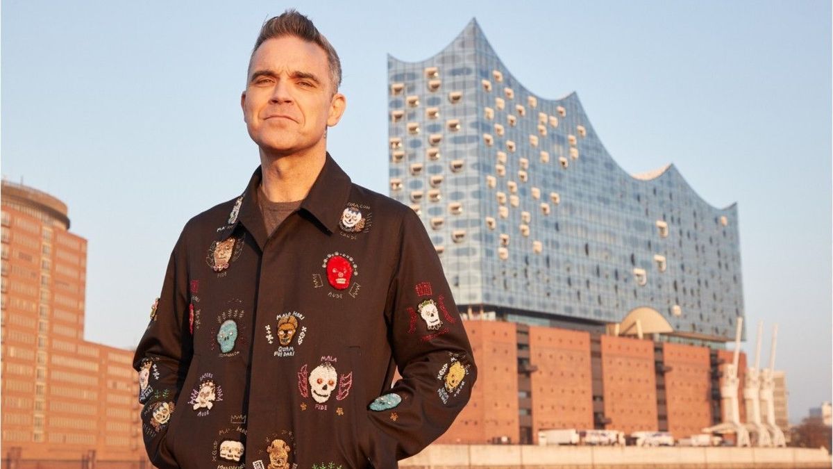 Trotz Menschenrechtsverletzungen: Robbie Williams will WM in Katar gucken