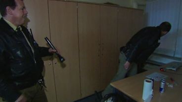 Hausdurchsuchung mit gezogener Waffe